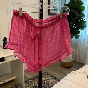 Lovers and friends small sheer shorts with tie waist and ruffled hem